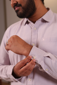 View of man in lavender shirt