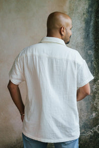 Back view of short-sleeved white shirt