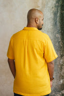 Back view of yellow shirt