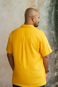 Back view of yellow shirt